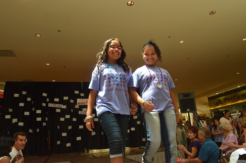 Adriana Alvarez and Rhean Stephens model self-confidence.