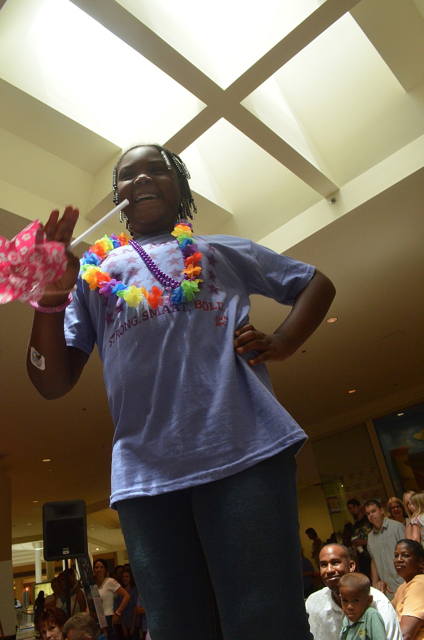 Jabrielle Nelson models self-confidence alongside her peers.