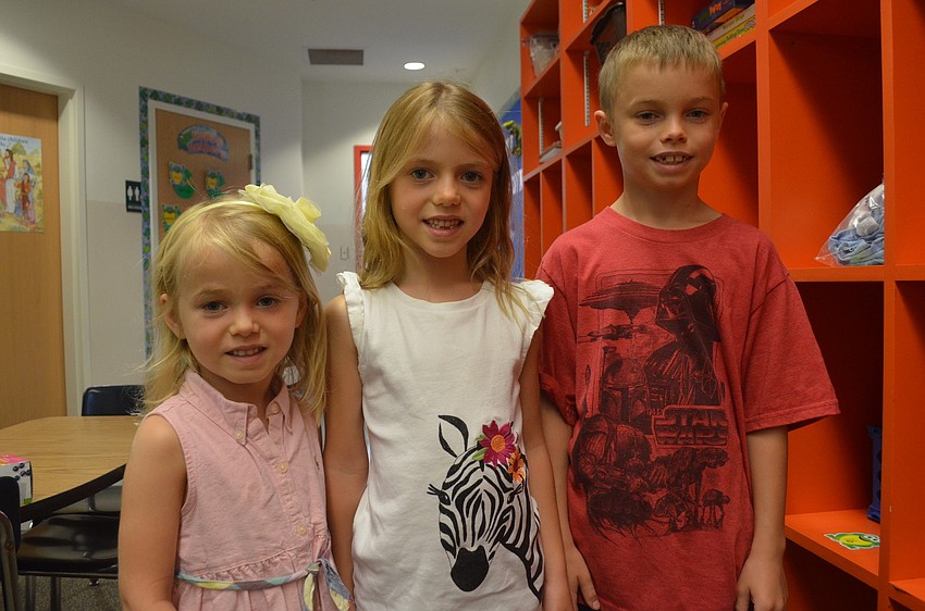 Annie Maloni, 4, will start kindergarten at St. Martha next year. Her sister Josie, 6, is entering first grade and her brother Matty, 8, is entering third grade.
