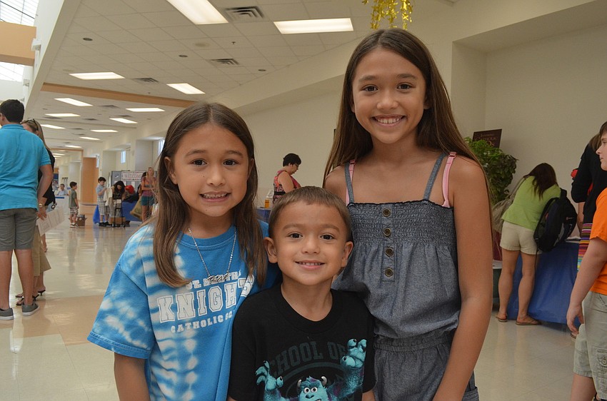 Katherine Kelley, 7, is entering second grade. Her little brother Jude, 5, is entering kindergarten and her older sister Sara, 11, is entering sixth grade.