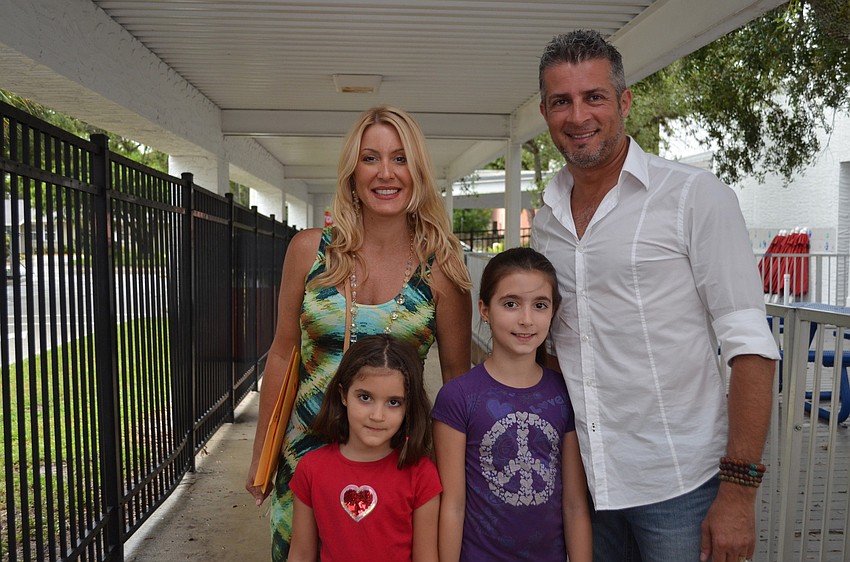 Carolina and Oscar Revelli with her daughters, Eva and Ashley.