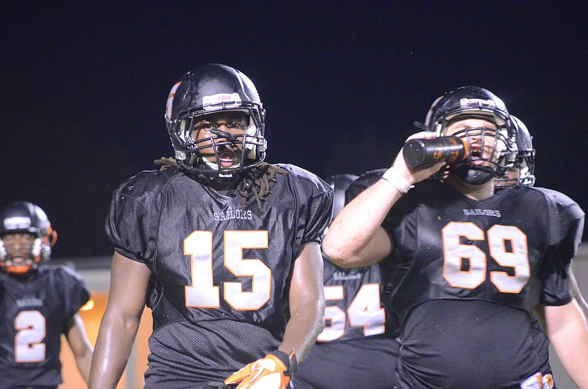 Players make sure to stay hydrated during the game.