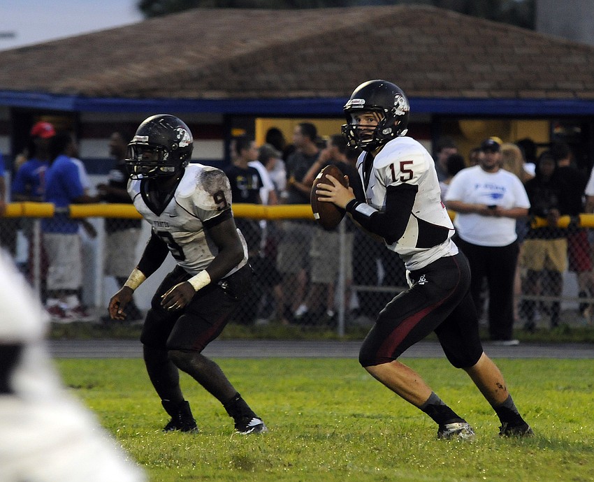 Braden River quarterback Dusty Peebles drops back to pass in the second quarter.