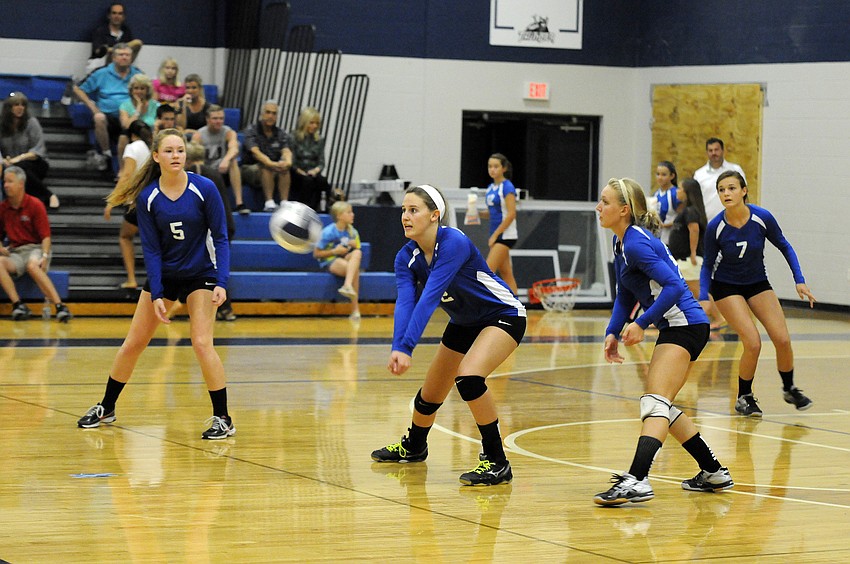 Cheyenne Miller digs the ball back to a teammate.