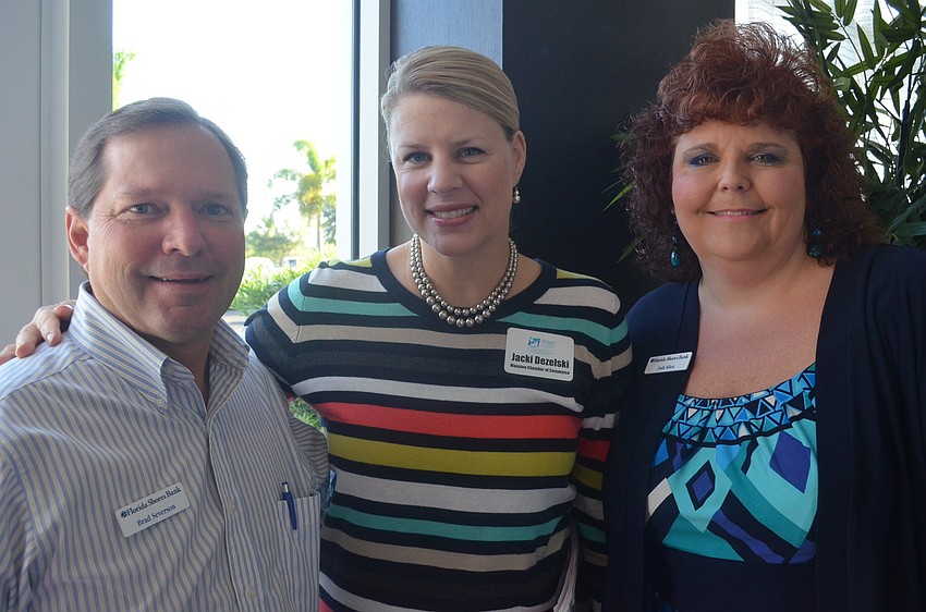 Brad Severson of Florida Shores Bank, Jacki Dezelski of the Manatee Chamber of Commerce and Jodi Allen of Florida Shores Bank
