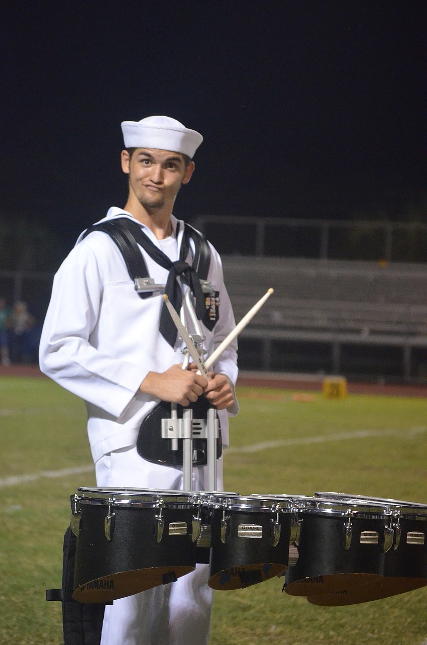 Sarasota High School senior Chefren Lanie plays the quads for the band.
