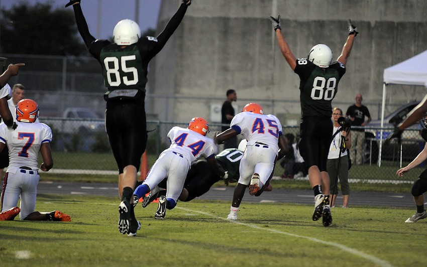 Lakewood Ranch tight ends Kyle Brady and Wyatt McLeod celebrate following the Mustangs successful two-point conversion.