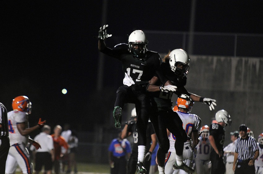 Lakewood Ranchâ€™s Brendan Hadley and Brandon Luckett celebrate following Hadleyâ€™s 9-yard touchdown catch in the fourth quarter.