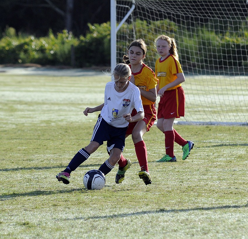 Tampa Bay United Southâ€™s Quinn Ryan looks to maintain possession.