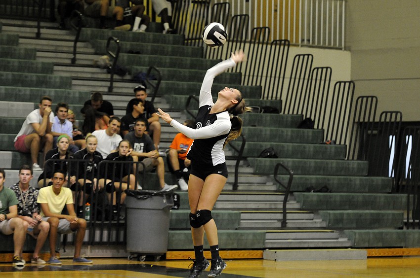 Lakewood Ranch senior Lauren Owens serves the ball late in the Lady Mustangs 25-18 Game 2 victory.