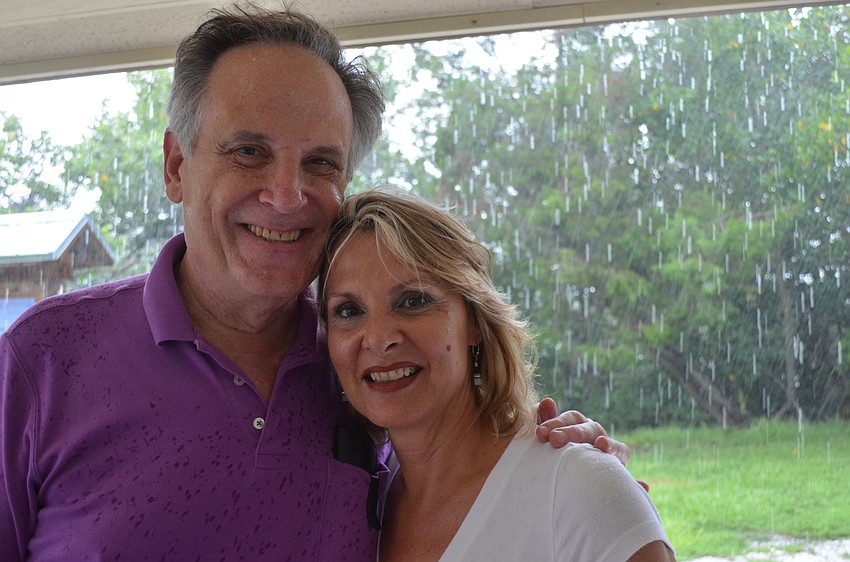Despite the torrential rain Richard and Pamela Hershorin joined community members for the celebration.