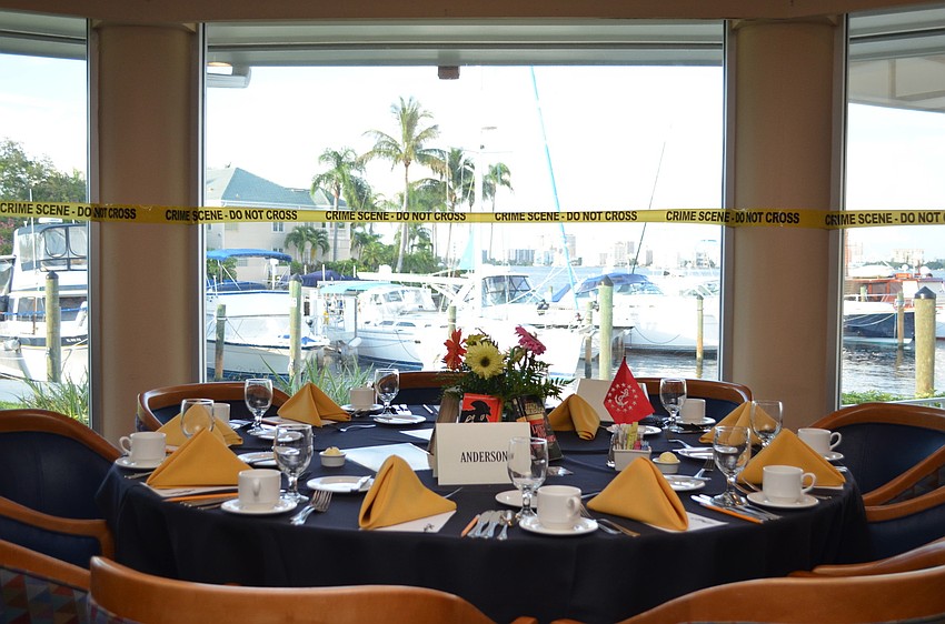 The Bird Key Yacht Club dinning room was lined with crime scene tape at the Murder Mystery Dinner Saturday, Sept. 7.