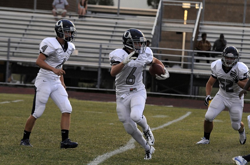 ODA freshman running back Jason Fineberg looks for a running lane on the Thunderâ€™s opening possession.