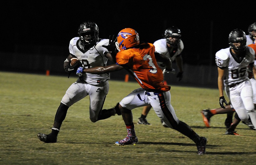 Braden River running back attempts to elude Southeast defensive back Demarquis Brice.