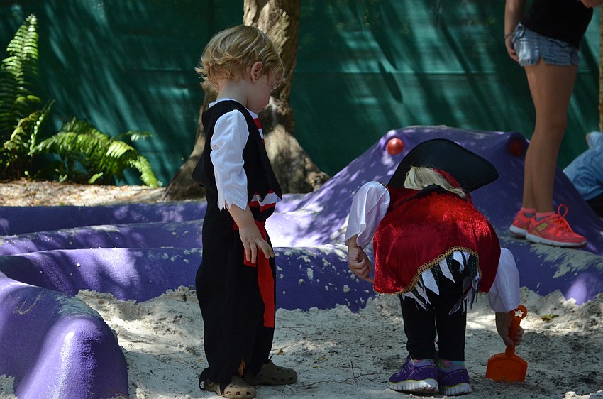 Brady Colcu and Makayla Digou dig for treasure.