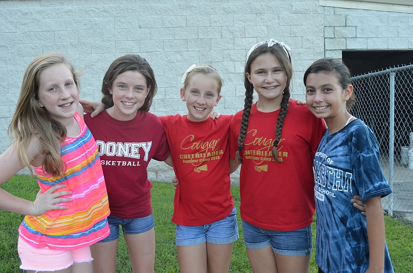 Madelyn Brown, 11, Grace Lumpkin, 11, Eliza Johnson, 11, Jessica Lammers, 12, and Nicole Huckell, 12, enjoy school spirit day.