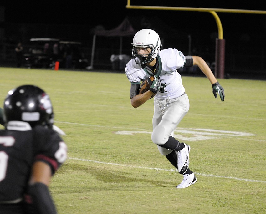 Lakewood Ranch sophomore Trevor Losada catches a past for a first down late in the first quarter.