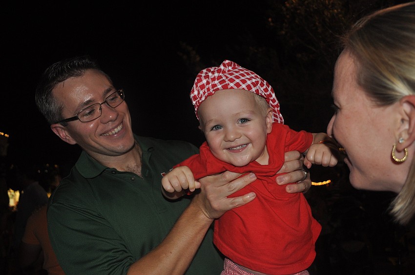 Dad Mike Hartley swings his son Everett