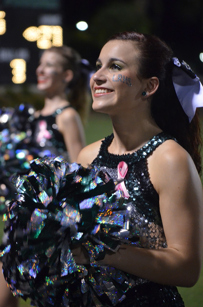 Angela Gennocro, 15, of the Lakewood Ranch Dance Team Silver Stars energizes the fans.