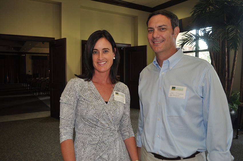 Erin Guzzo and Eric Dunham of Al Purmort Insurance