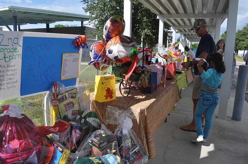 Each grade presented prizes that were bid on.