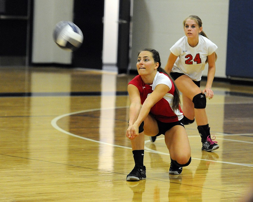 Cardinal Mooney libero Maria Soscia digs the ball in the second set.