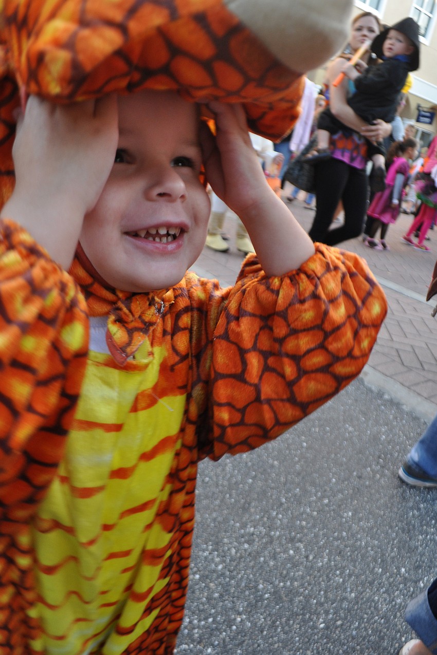 Finnegan Gillece, 3, dressed as a triceratops.