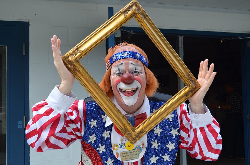 Chuck Sidlow greets attendees