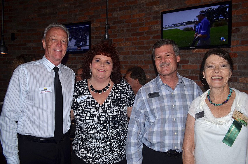 Tony Dempsey, Jodi Allen, Tom Roberts and Bonnie Hassler make new friends.