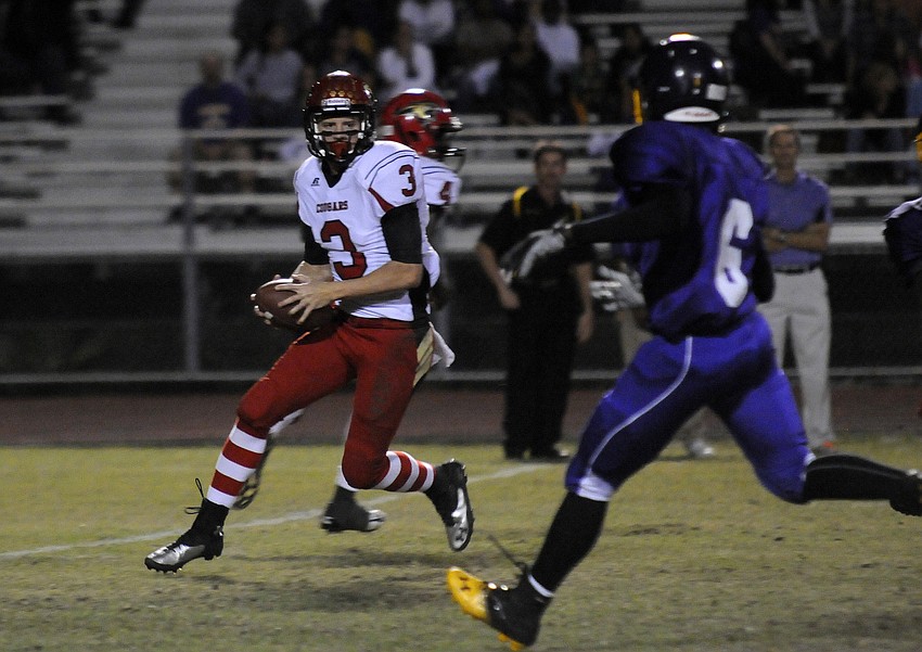 Cardinal Mooney senior Austin Leach attempts to get back to line of scrimmage.