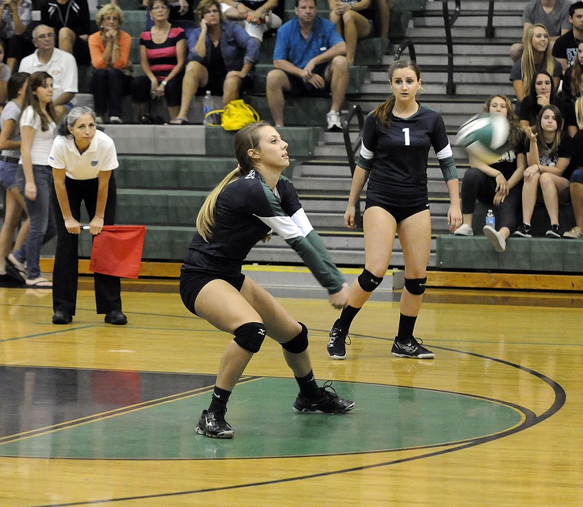 Senior Lauren Owens digs the ball in the second set.