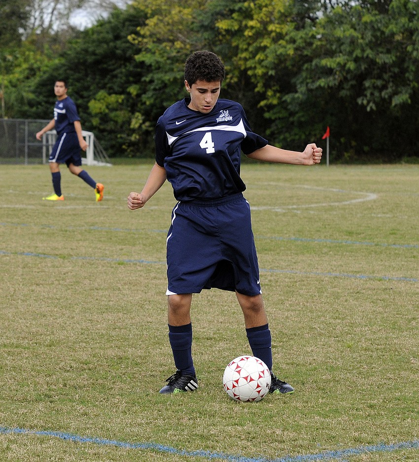 Jose Juncosa controls the ball for The Out-of-Door Academy.