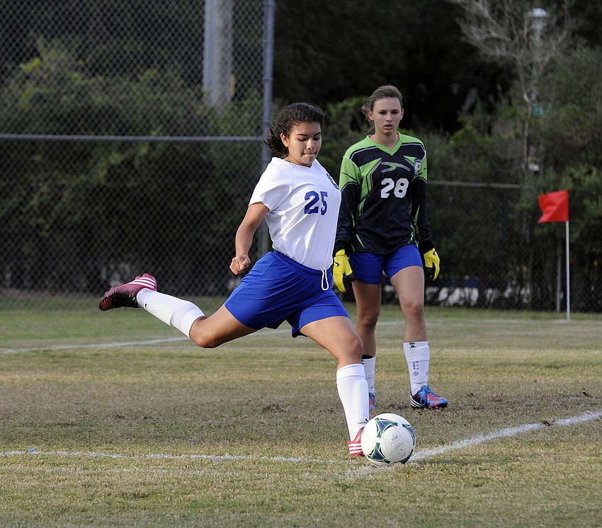 Sarasota Military Academyâ€™s Laura Orjuela takes a goal kick in the first half for the Lady Eagles.