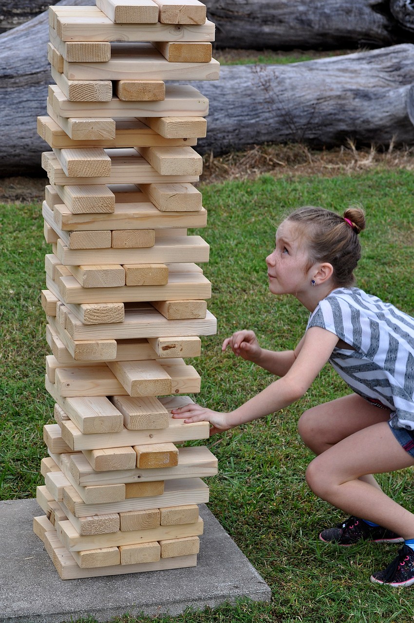 Ella Brauch, 7, plans her next step very carefully.