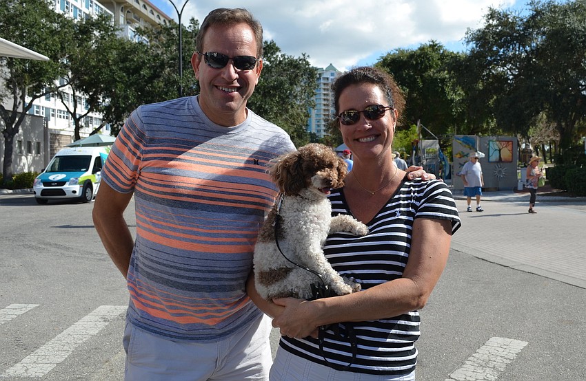 Lina and Erik Lotta with Lucy the poodle