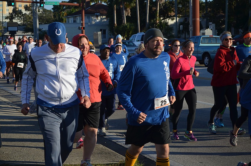 Runners pound the pavement for the Turkey Trot 5K.