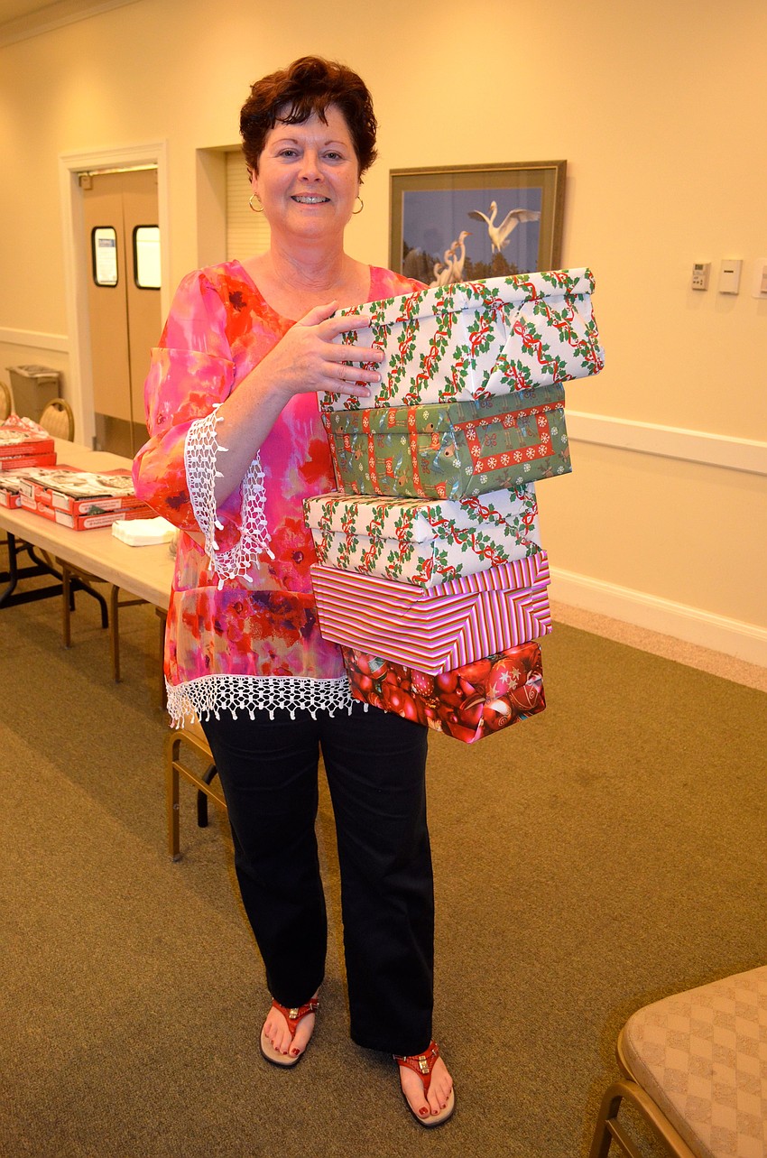 Marie Gowgiel shows off ready-to-go boxes.