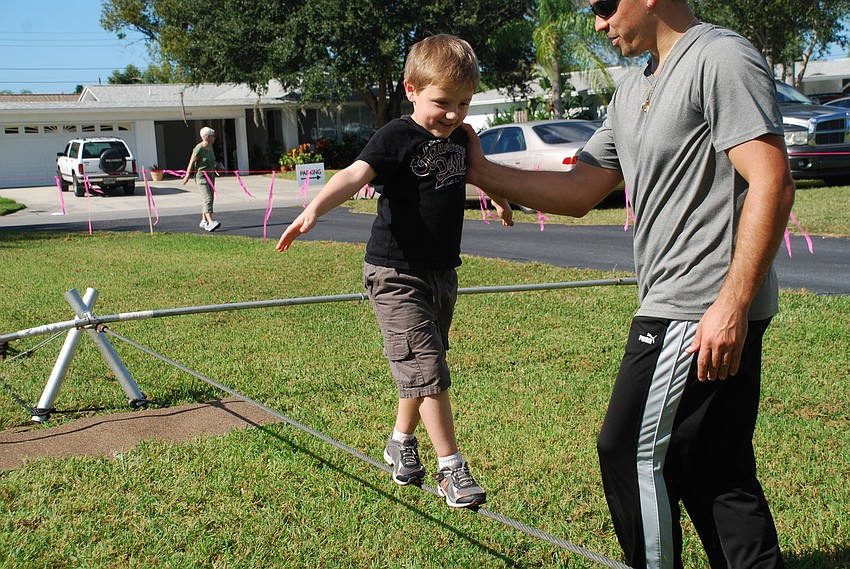 Nicholas Castellana tries to walk the wire with the Wallenda family