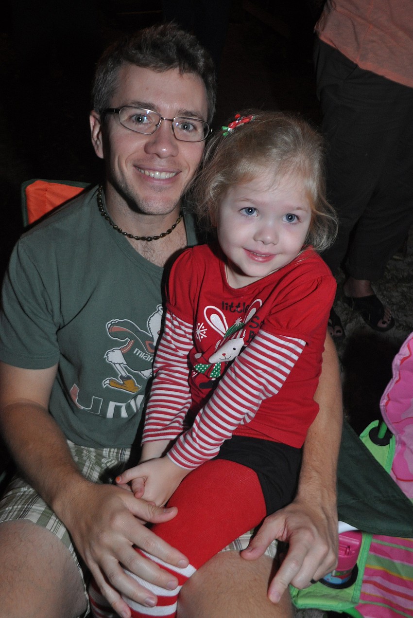 Mike and Addy Hartley set up their chairs on the dock at Linger Lodge.