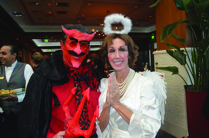 Alex and Marlene Lancaster bring a touch of good and evil to Sarasota Yacht Club's Monster Mash Oct. 26.