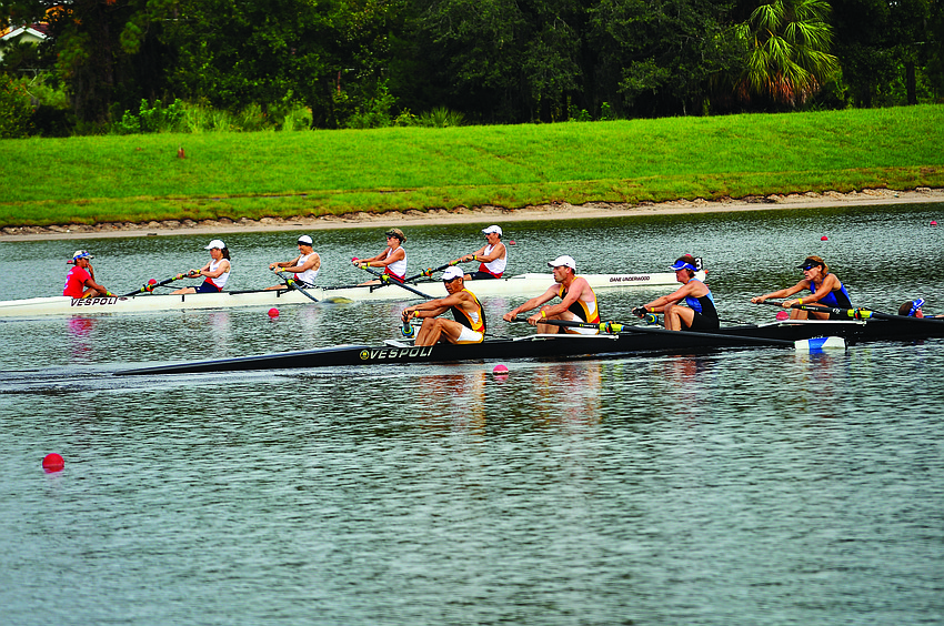 Competitors in the mixed 4s race toward the finish line at the 2013 Masters National Championships at Nathan Benderson Park.