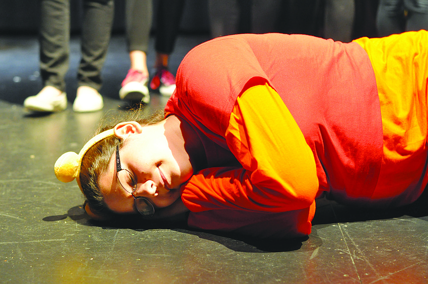 Helena Beltrao, as Winnie the Pooh, dreams of honey, during The Out-of-Door Academy's production of 