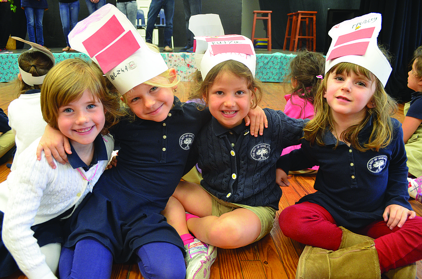 Preschoolers Sami Fox, Anezka Svobodova, Katya Sommers and Trinity Dougherty celebrate Dr. Seuss' birthday March 1,  at The Out-of-Door Academy.