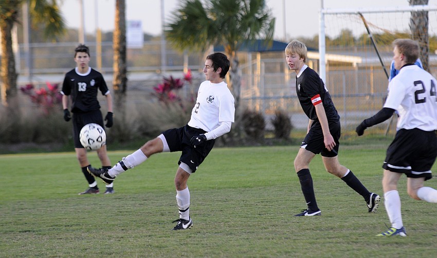 Lakewood Ranch midfielder Felipe Dangond attempts to maintain possession for the Mustangs.