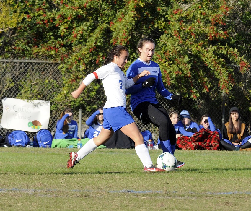 SMAâ€™s Mia Venafro and Sarasota Christianâ€™s Cecelia Genson battle for possession in the first half.