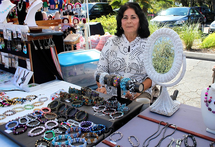 Fran Pignato sells her jewelry at the Longboat Key Winter Festival.
