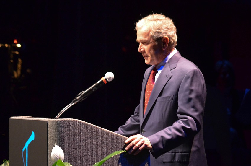 George W. Bush cracks a joke about how Sarasota had visits from his wife and daughter and are now working our way down the food chain.