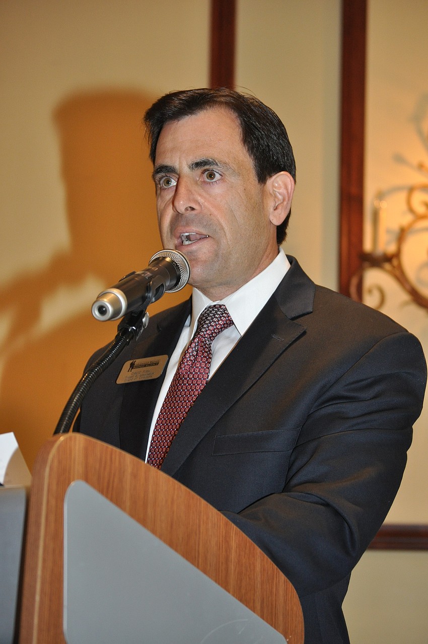 David Fink, chairman elect, announces sponsors.