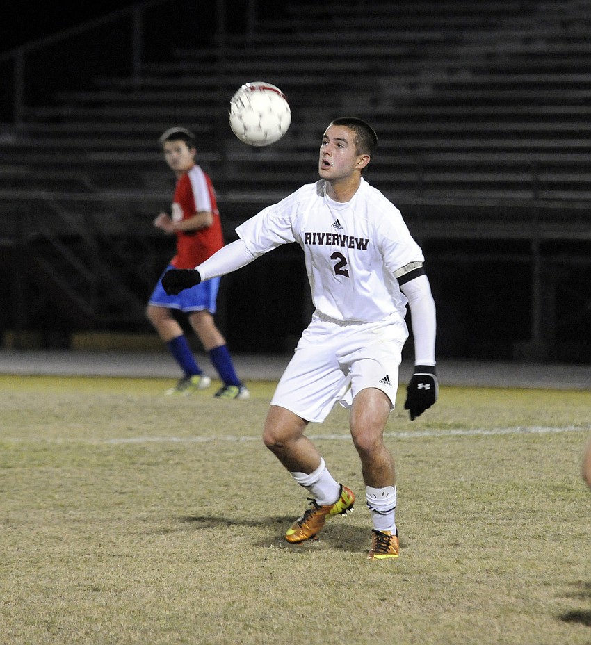 Riverview midfielder JT Truitt controls a pass to maintain possession for the Rams in the first half.