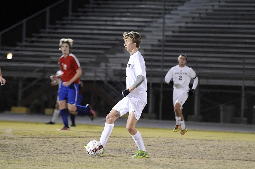 Riverview midfielder Andrew Yull pushes the ball down the field for the Rams.